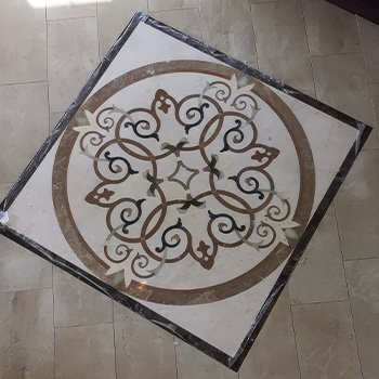 Inlaid stone floor medallion
