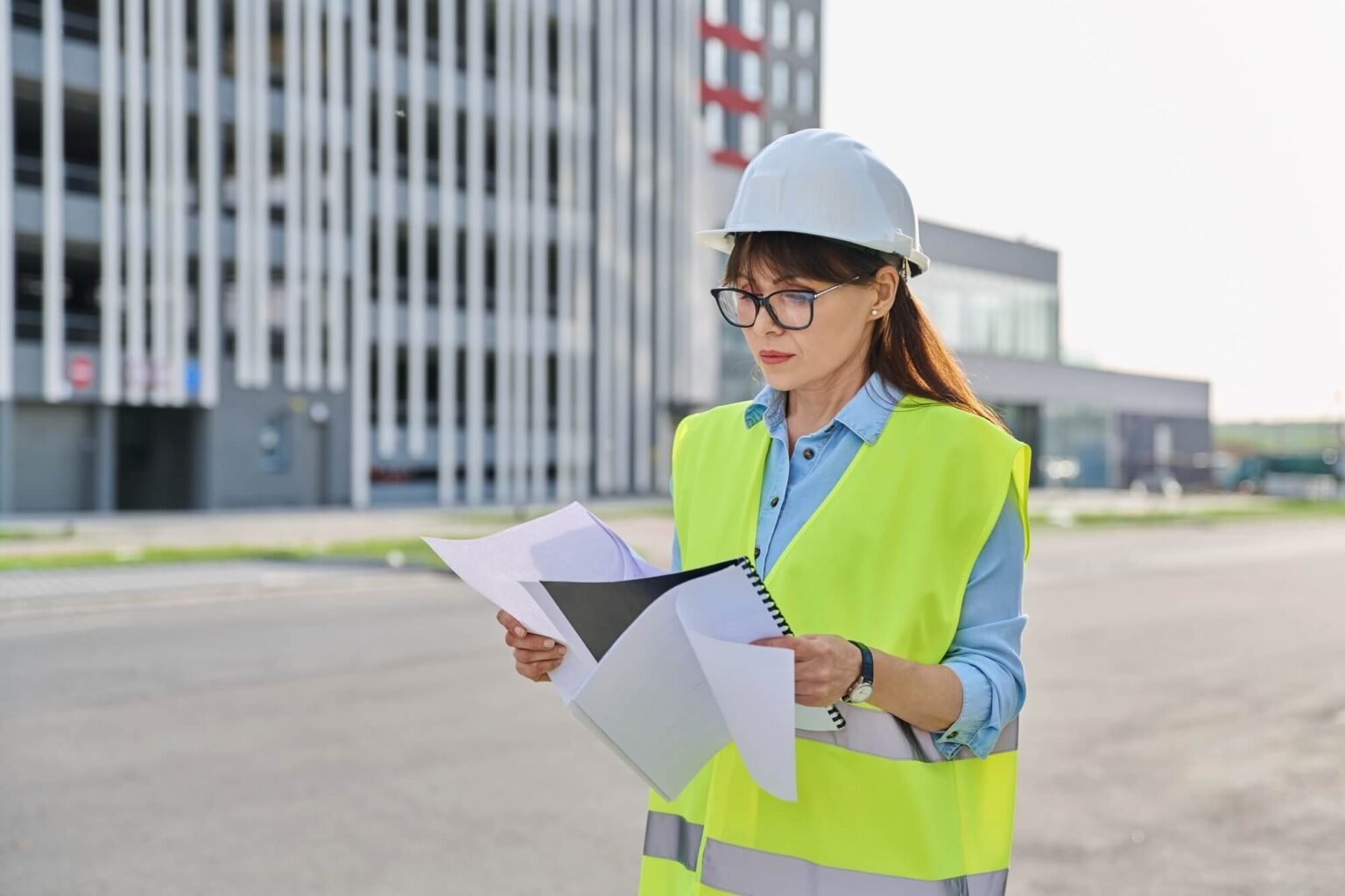 Project coordinator reviewing documents